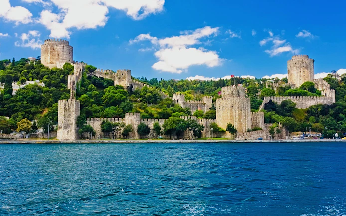 Rumeli Fortress along the Bosphorus in Istanbul, Turkey, with stone walls and towers.