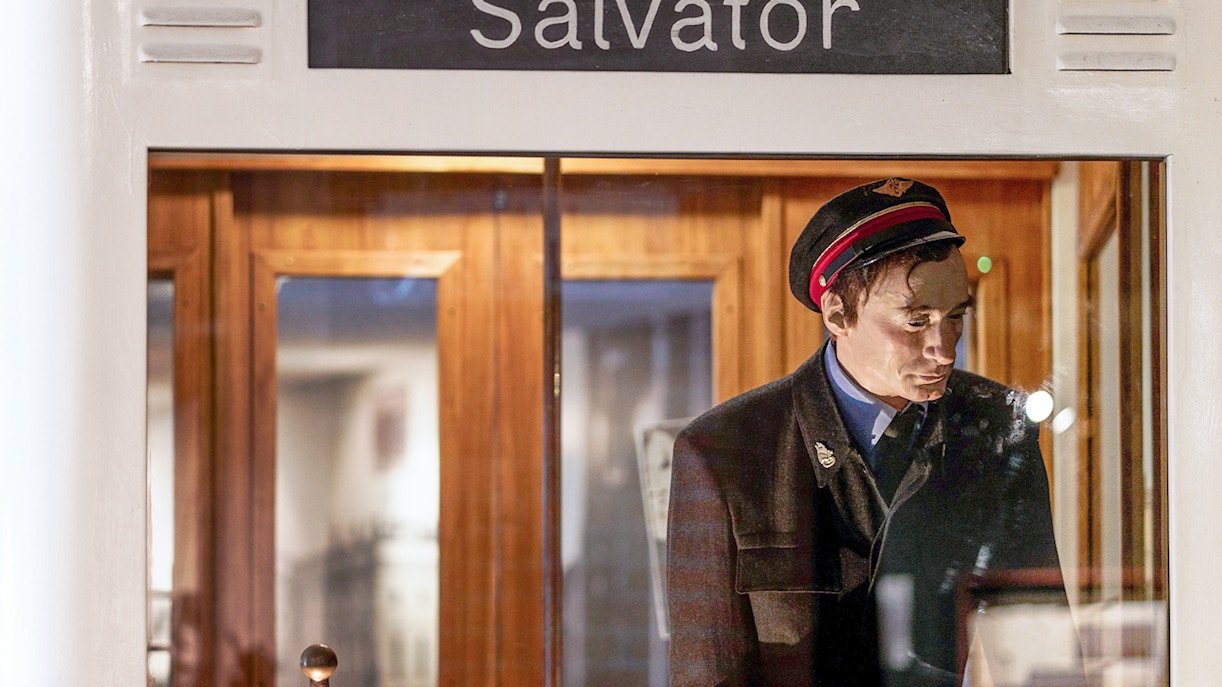 Statue of station master inside Schindler's Factory Museum, Krakow.