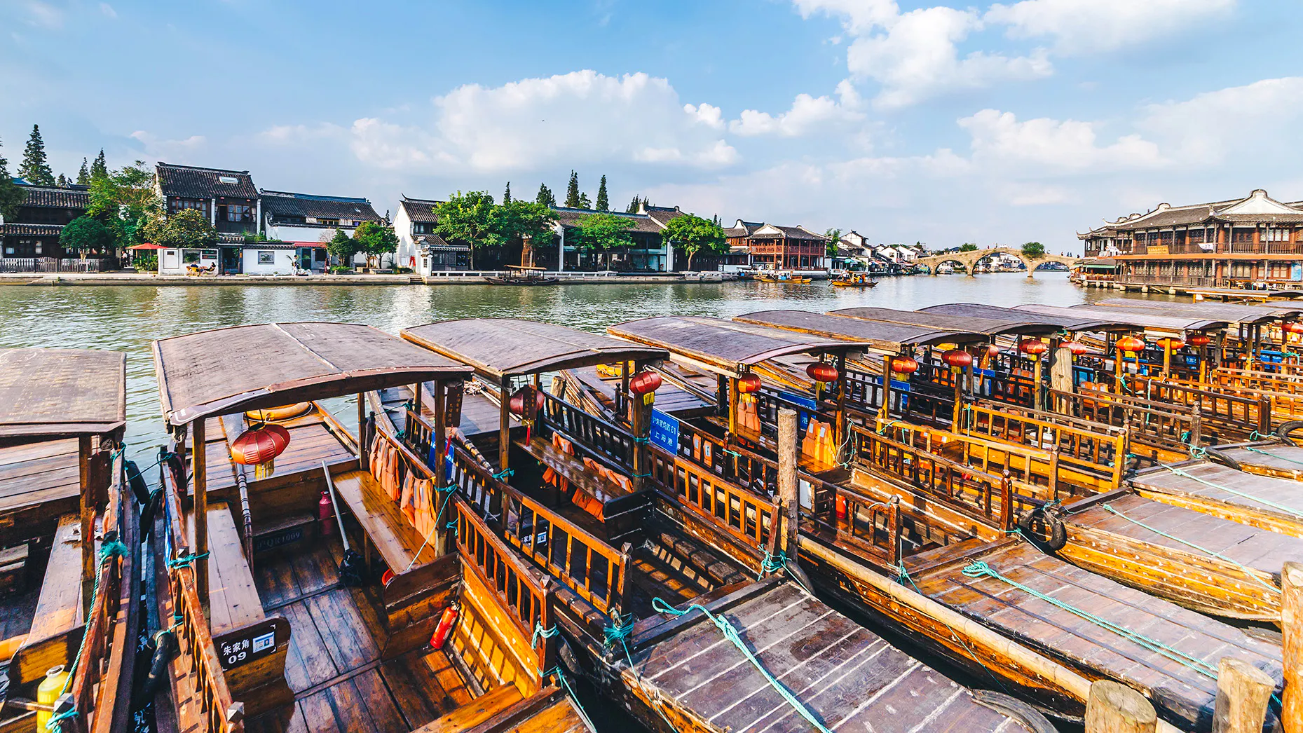 Traditional wooden boats docked at Zhujiajiao Water Town near Shanghai.