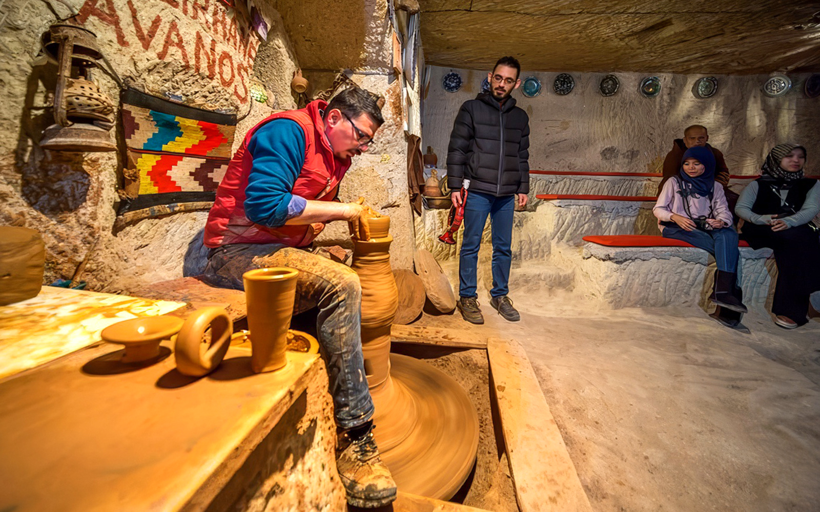 Guests participating in pottery making at Cappadocia workshop, Turkey.