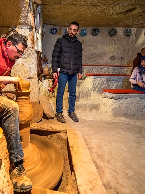 Guests participating in pottery making at Cappadocia workshop, Turkey.