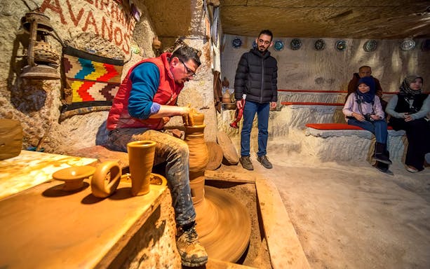 Guests participating in pottery making at Cappadocia workshop, Turkey.