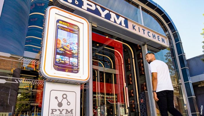 PYM Kitchen buffet with themed dishes at Disneyland Paris.