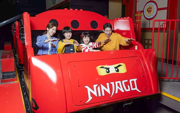 Family enjoying Ninjago ride at LEGOLAND Korea.