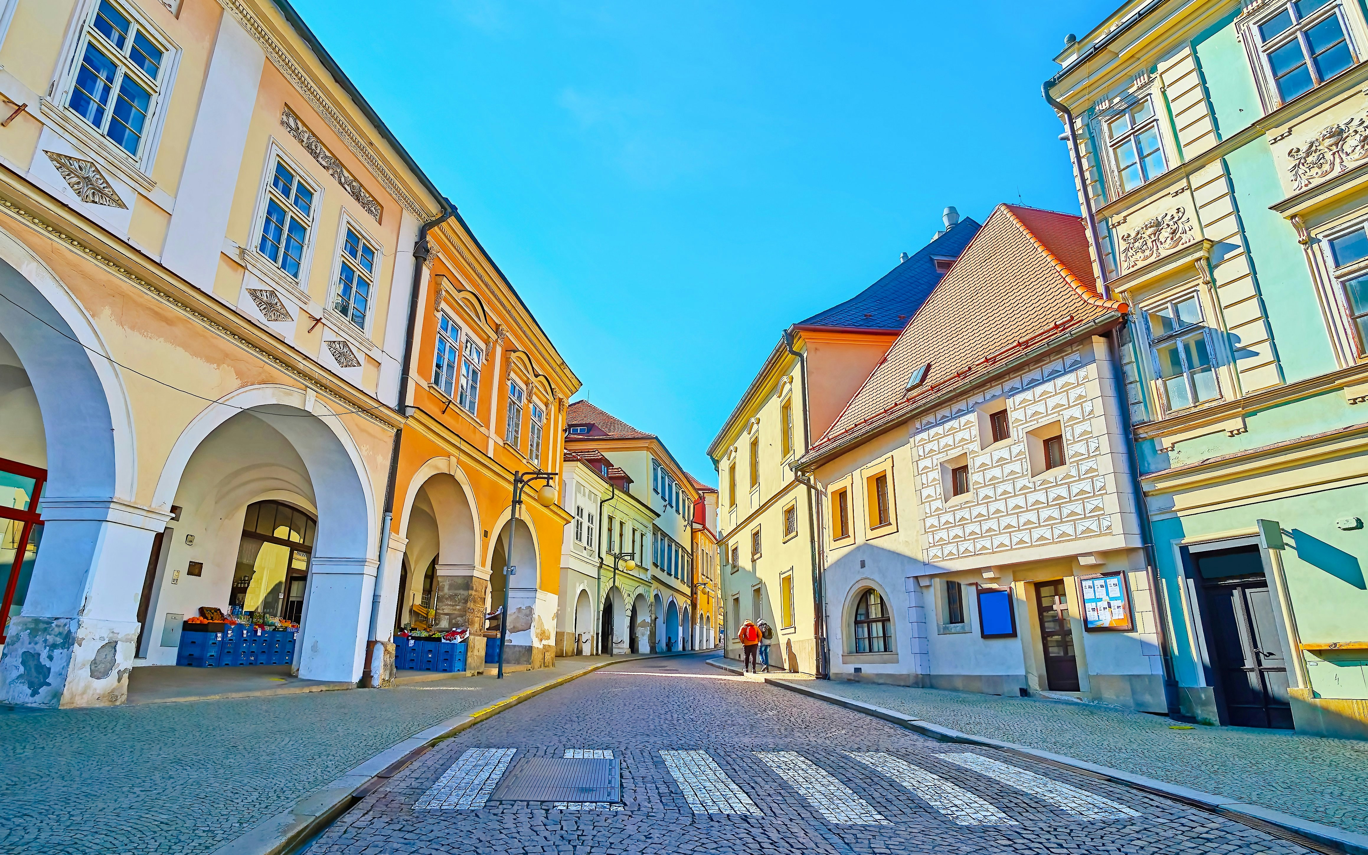Pedestrian street with historic buildings in Palackého Square, Kutna Hora.