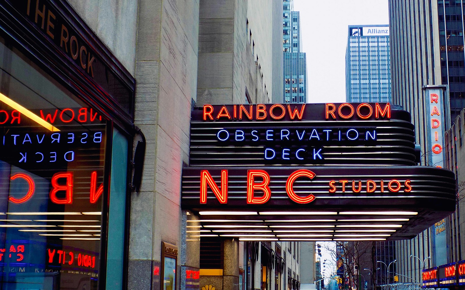 NBC Studios neon sign at Rockefeller Center during guided tour in New York City.