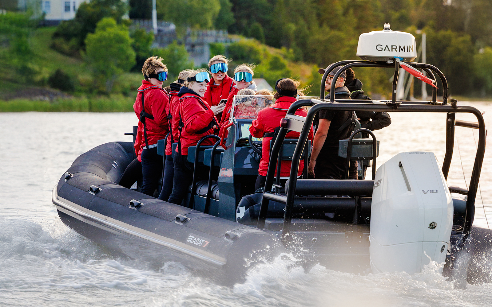 Passengers on a RIB speed boat tour in Stockholm waters.