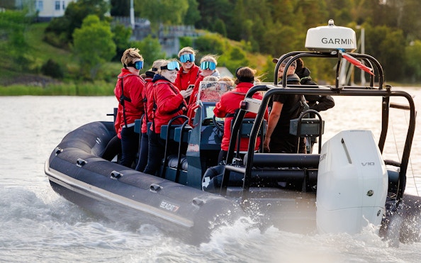 Passengers on a RIB speed boat tour in Stockholm waters.