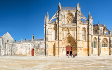 Batalha Monastery facade with intricate Gothic architecture in Portugal.