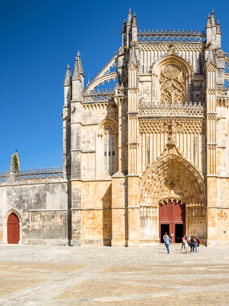 Batalha Monastery facade with intricate Gothic architecture in Portugal.