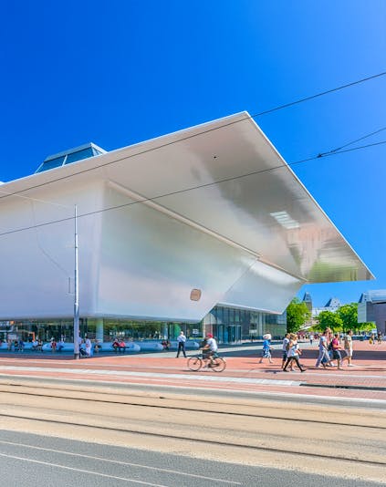 Stedelijk Museum Amsterdam exterior with modern art sculptures.