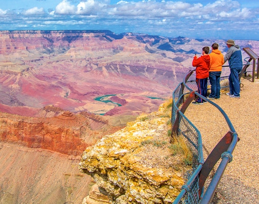 Tourists enjoying a scenic view from the Grand Canyon South Rim Bus tour in Las Vegas