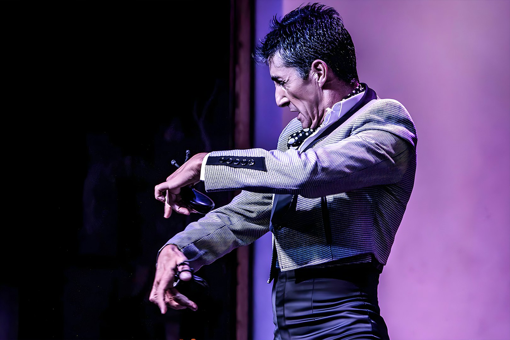 Flamenco dancer performing at Tablao El Arenal in Seville.