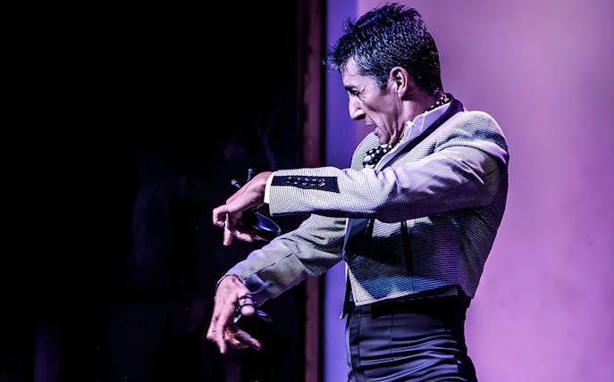 Flamenco dancer performing at Tablao El Arenal in Seville.