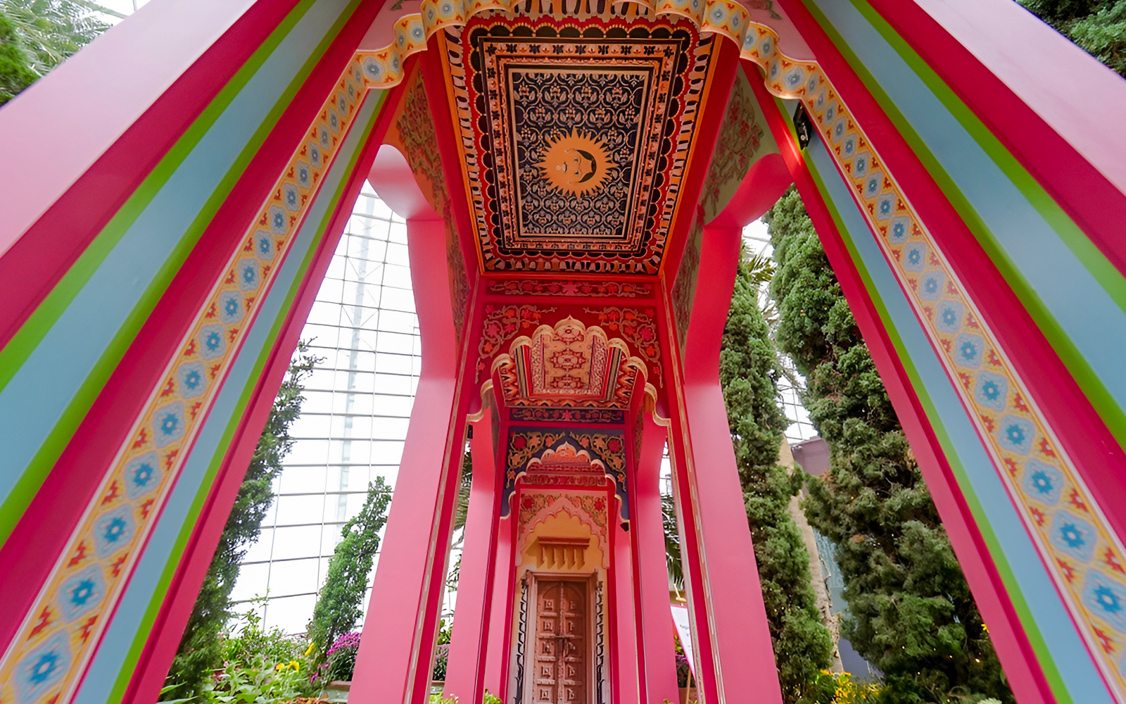 Colorful archway in Sunflower Surprise exhibit, Gardens by the Bay, Singapore.