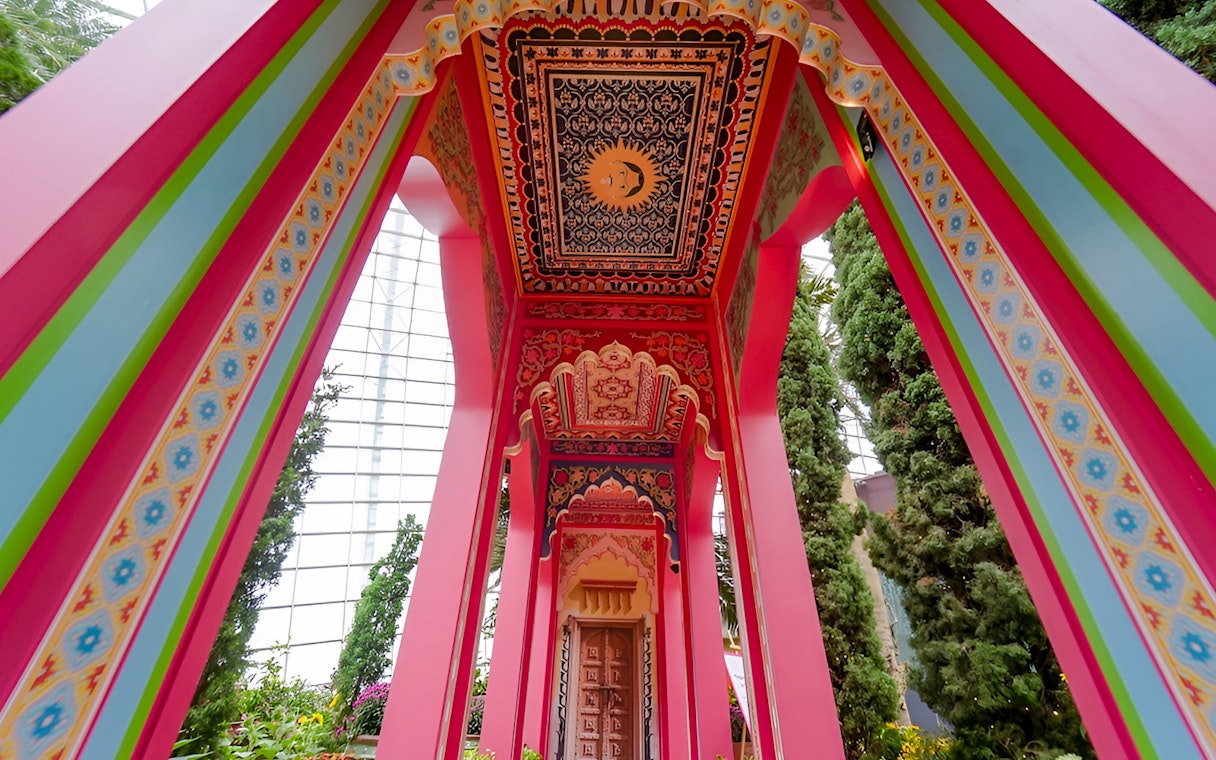 Colorful archway in Sunflower Surprise exhibit, Gardens by the Bay, Singapore.