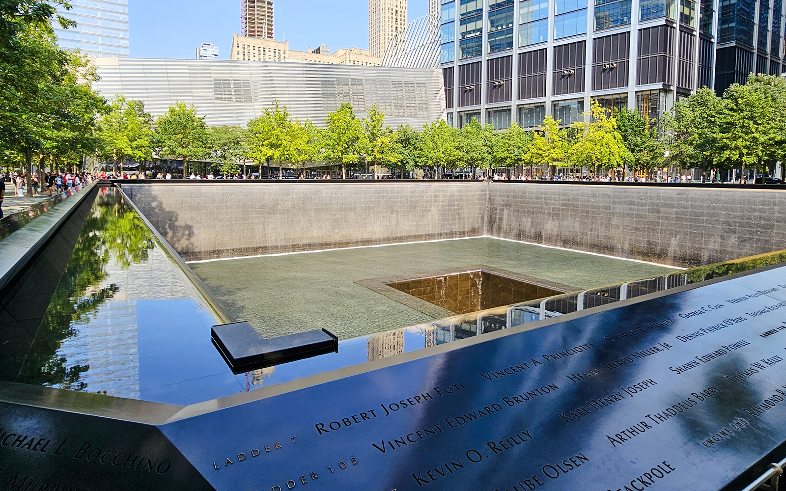 National September 11 Memorial reflecting pool with engraved names, New York City.