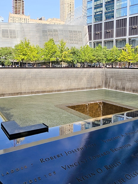 National September 11 Memorial reflecting pool with engraved names, New York City.