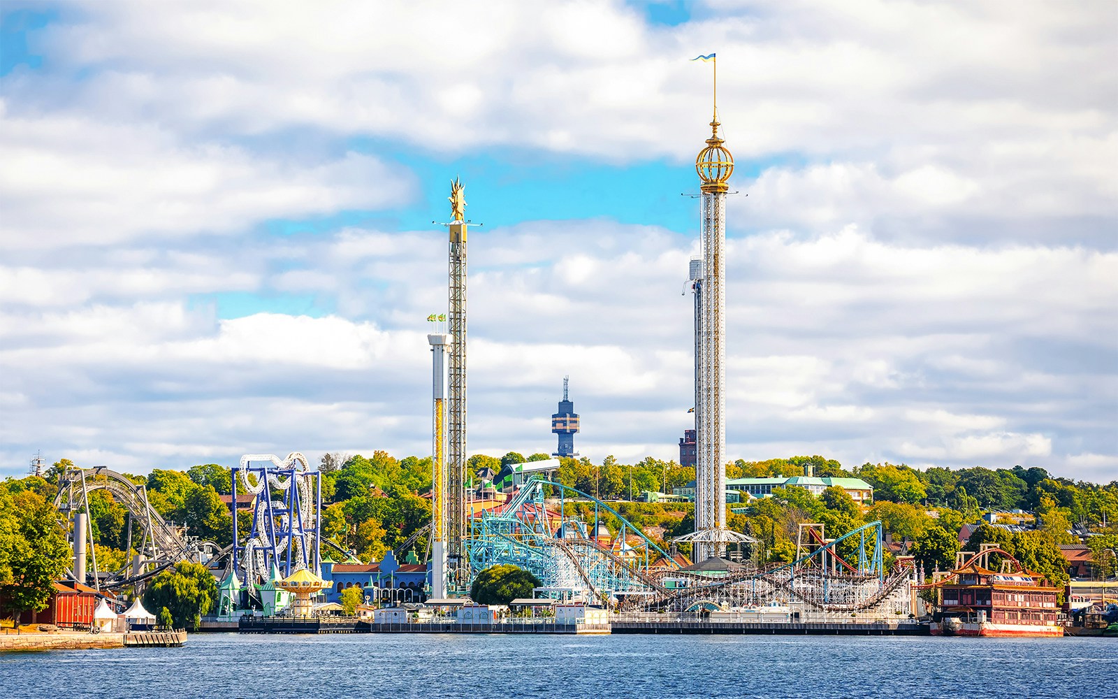 Grna Lund amusement park and Stockholm waterfront from Djurgrden City Canal Cruise.