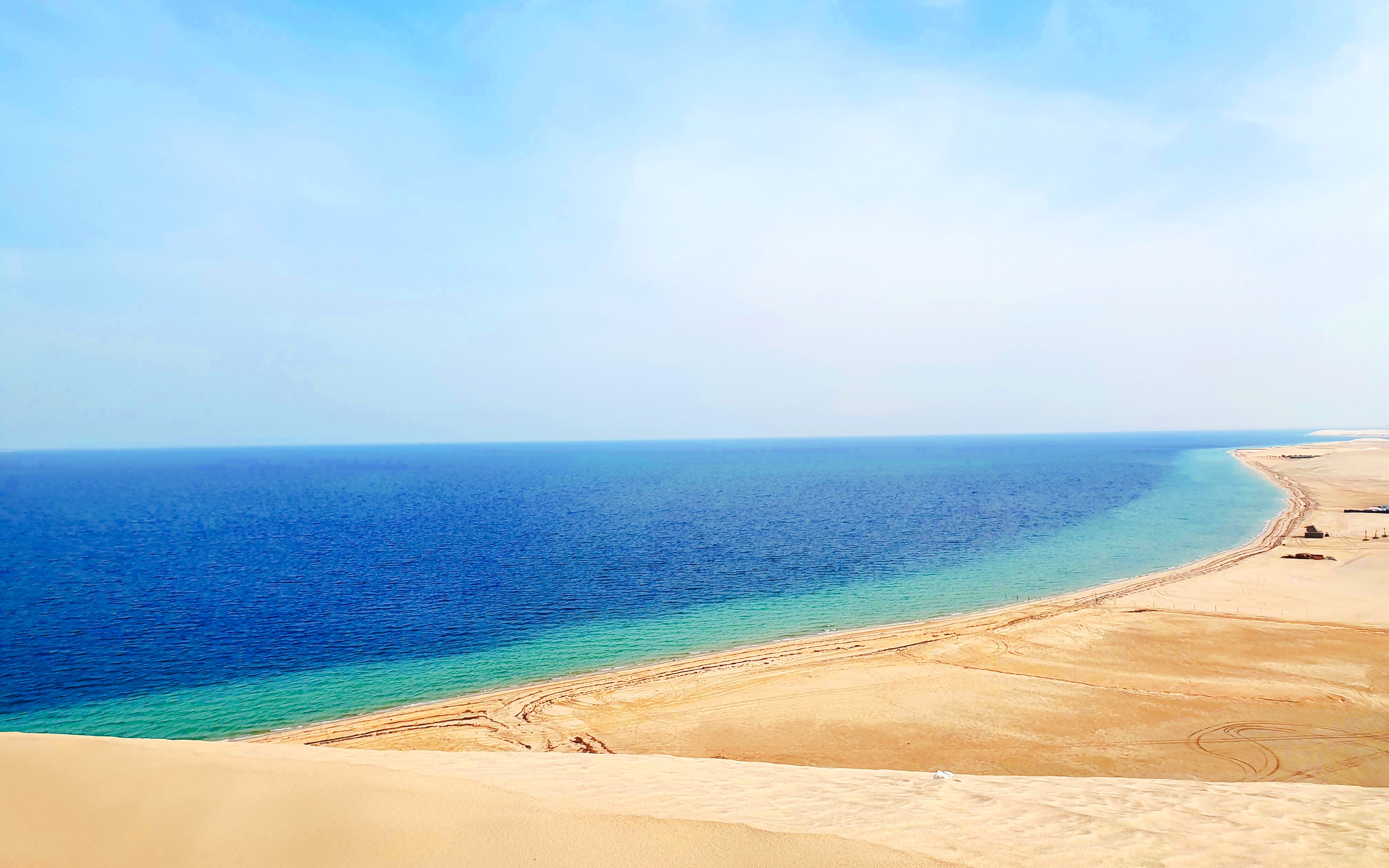 Khor Al Adaid desert meeting the sea in Doha, Qatar.