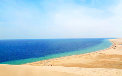 Khor Al Adaid desert meeting the sea in Doha, Qatar.