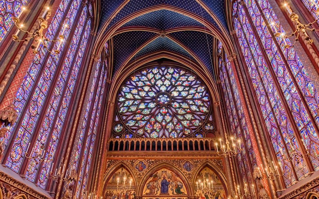 Stained glass windows and rose window inside Sainte Chapelle, Paris.