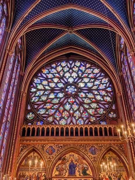 Stained glass windows and rose window inside Sainte Chapelle, Paris.
