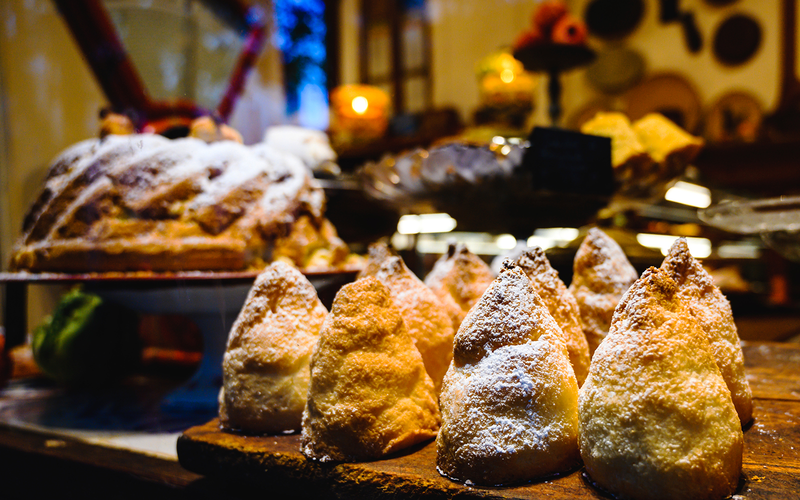 La Lonja district street scene in Mallorca with outdoor café and tourists exploring.