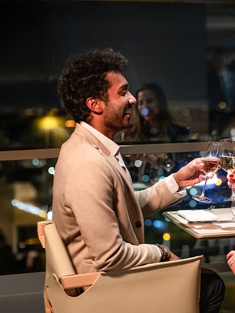 Couple dining at Madame Brasserie, Eiffel Tower, Paris.
