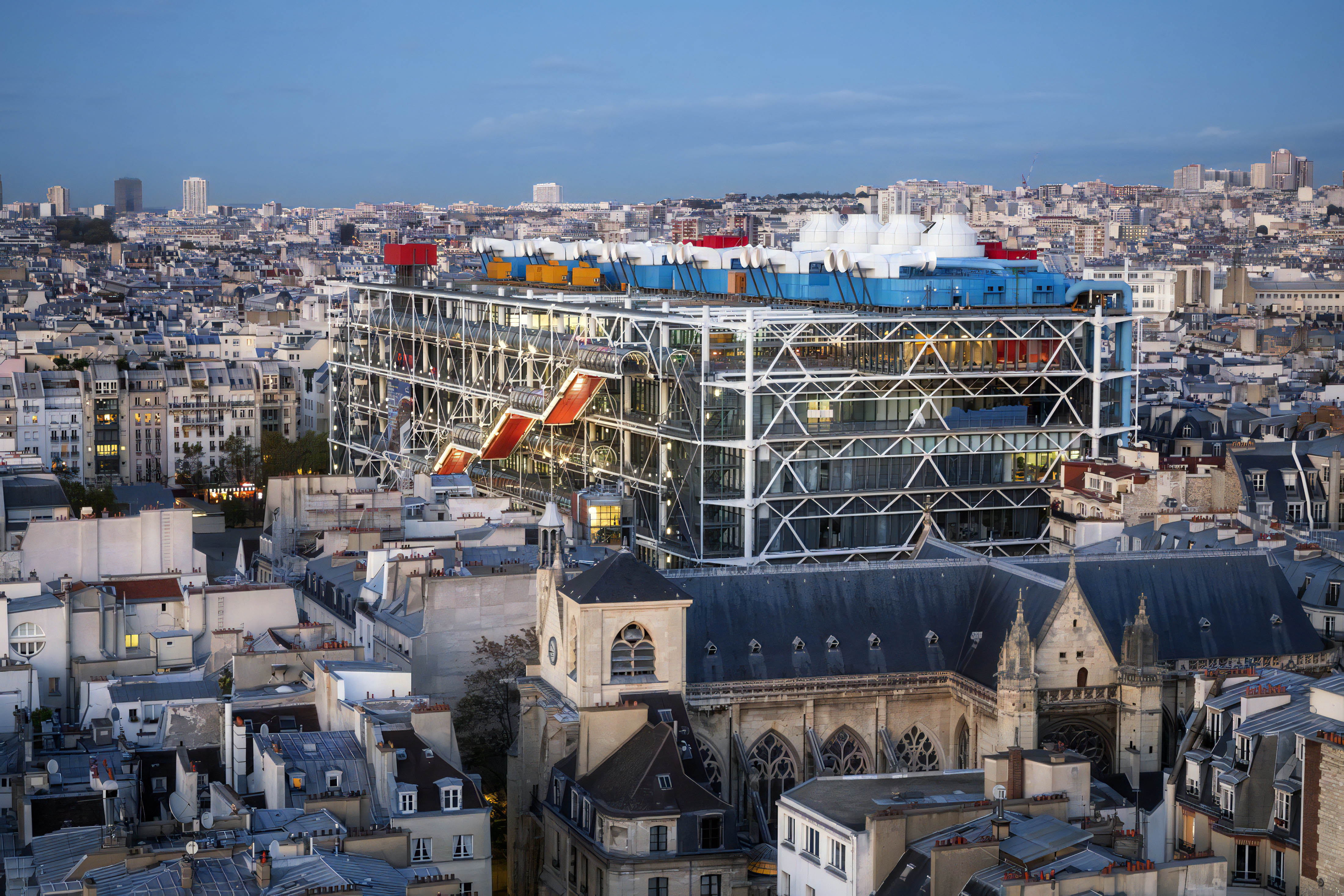 Centre Pompidou in Paris with its colorful exterior and surrounding cityscape.