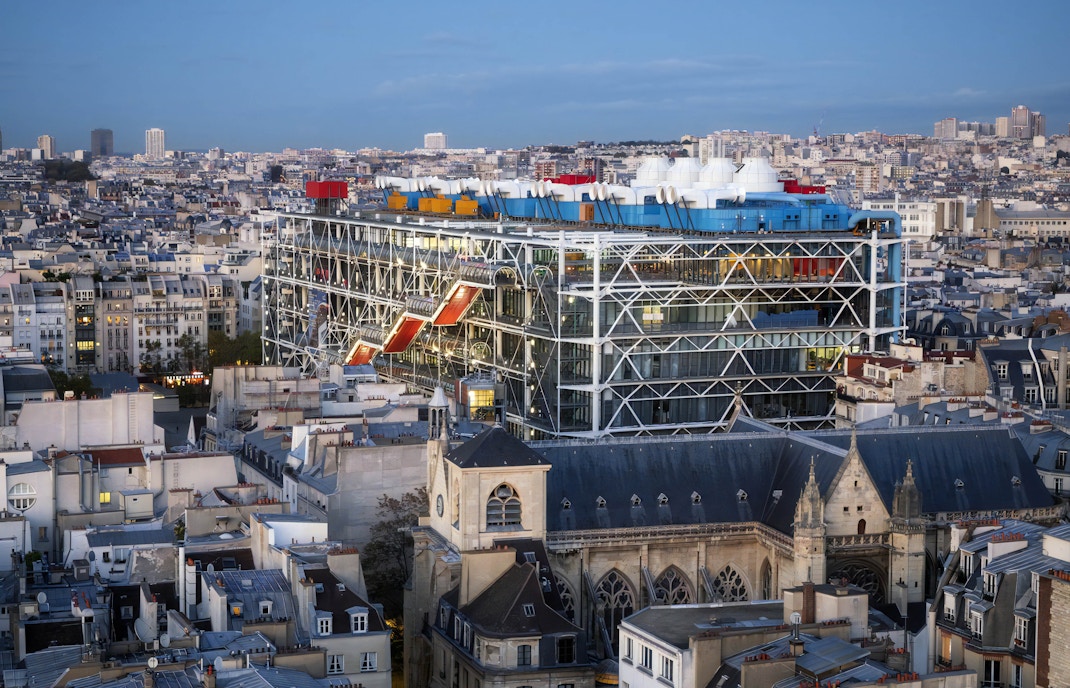 Centre Pompidou Paris exterior with colorful pipes and modern architecture.