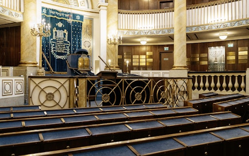 Stadttempel interior with ornate Torah ark and seating, Vienna.