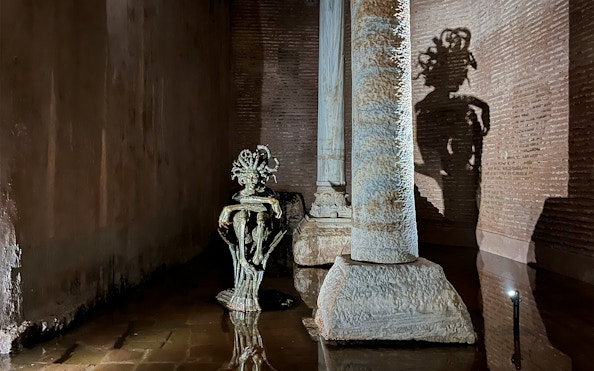 Underground Medusa head statue in Basilica Cistern, Istanbul.