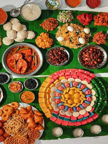 Traditional Malaysian dishes and colorful sweets displayed at Wonder Food Museum.