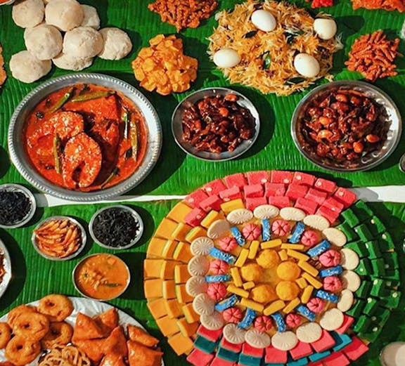 Traditional Malaysian dishes and colorful sweets displayed at Wonder Food Museum.