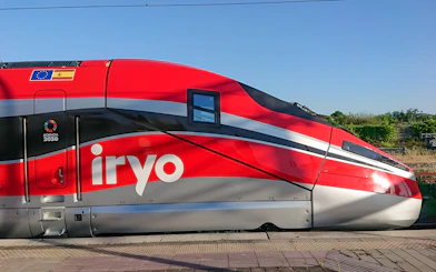 High-speed train at Barcelona Sants station for Madrid Atocha route.