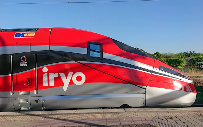 High-speed train at Barcelona Sants station for Madrid Atocha route.