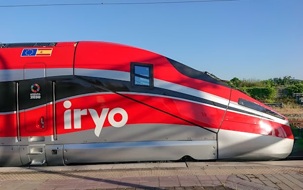 High-speed train at Barcelona Sants station for Madrid Atocha route.