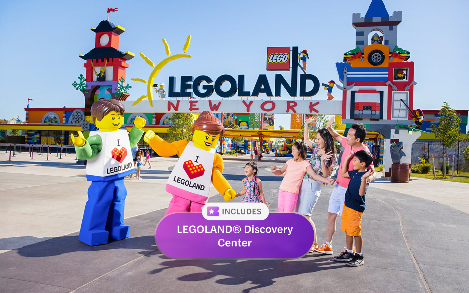 LEGOLAND New York entrance with family and LEGO characters, includes Discovery Center.