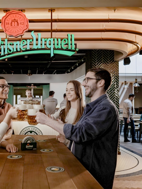 Tourists enjoying beer at Pilsner Urquell The Original Beer Experience.