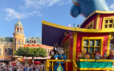 Disney Adventure Friends Cavalcade with Judy Hopps on a colorful parade float.
