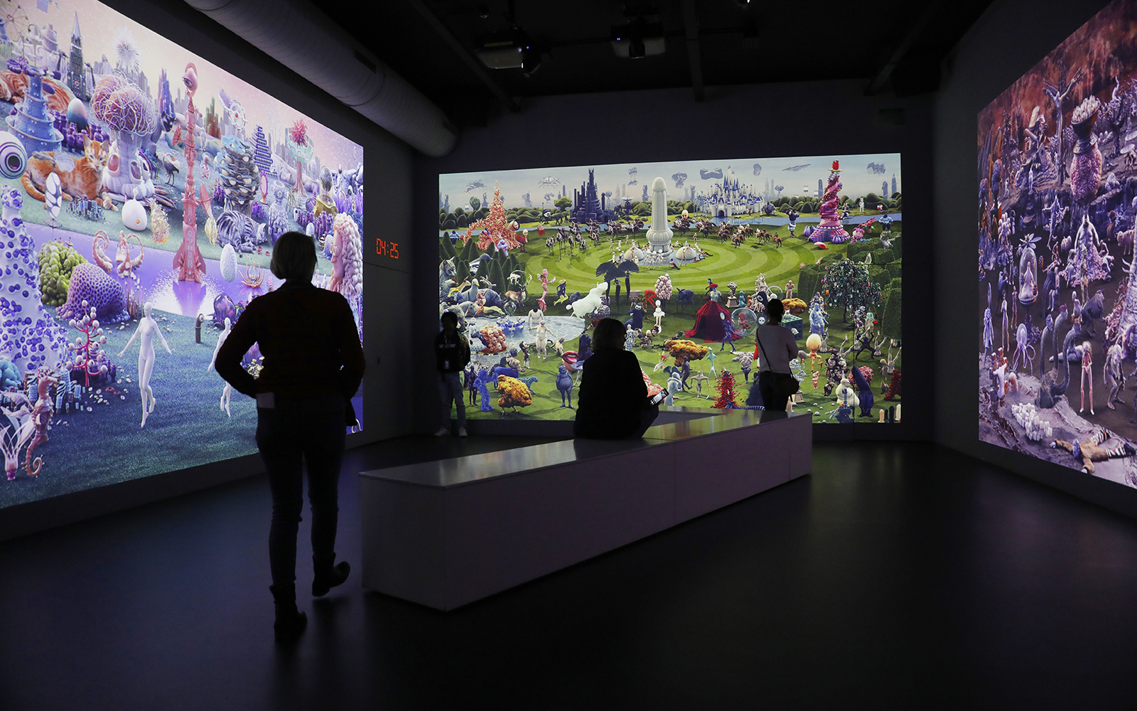 Guests viewing digital art at Remastered audiovisual experience in Rotterdam.