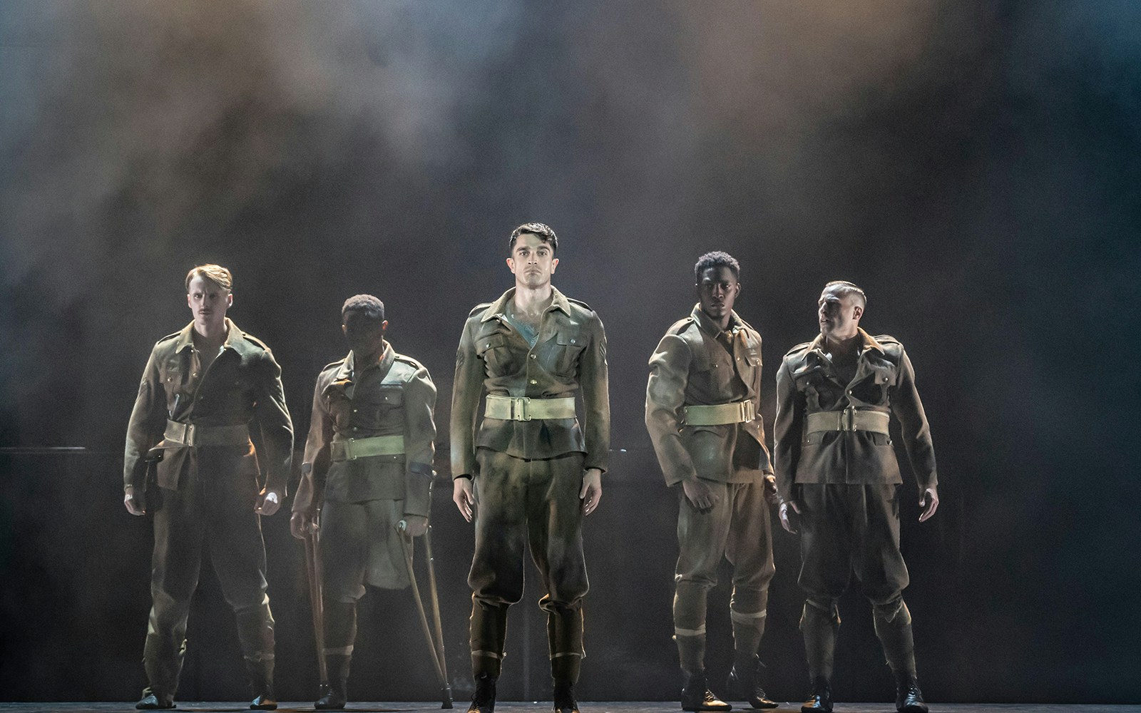 Soldiers in uniform on stage during Peaky Blinders: The Redemption of Thomas Shelby performance.