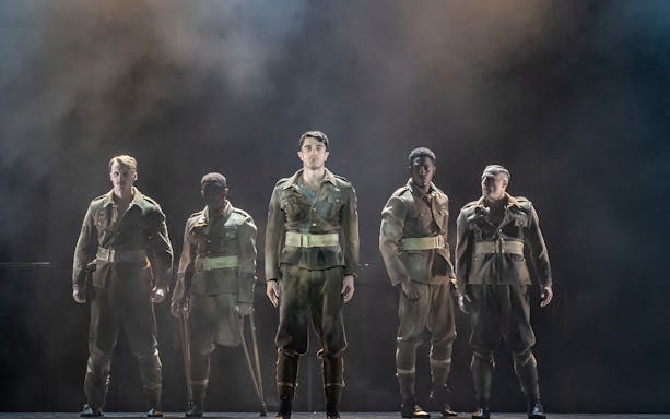 Soldiers in uniform on stage during Peaky Blinders: The Redemption of Thomas Shelby performance.