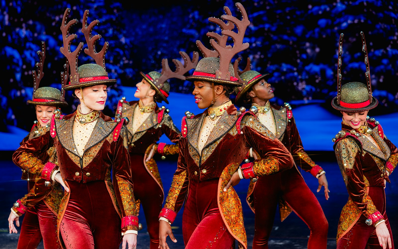 Rockettes performing in reindeer costumes at Radio City Christmas Spectacular.