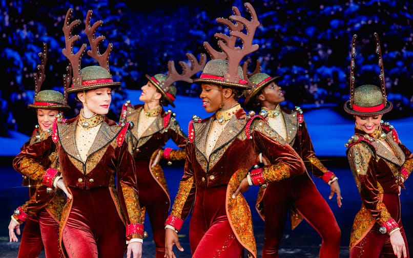 Rockettes performing in reindeer costumes at Radio City Christmas Spectacular.