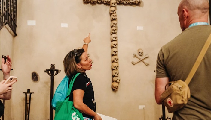 Tourists at Basilica of San Nicola before Roman Catacombs and Capuchin Crypts tour, Rome.