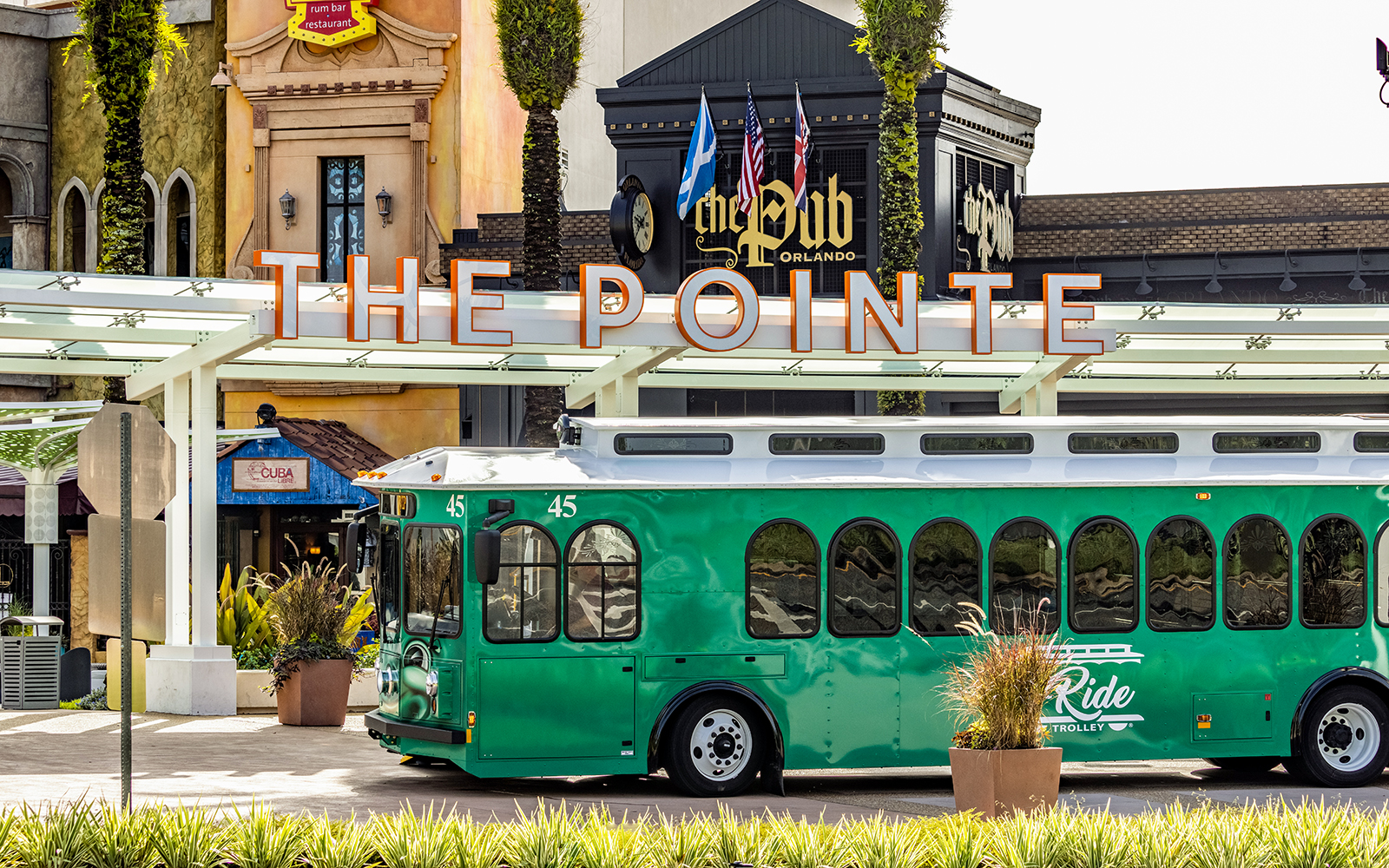 Green I-Ride Trolley at The Pointe Orlando.