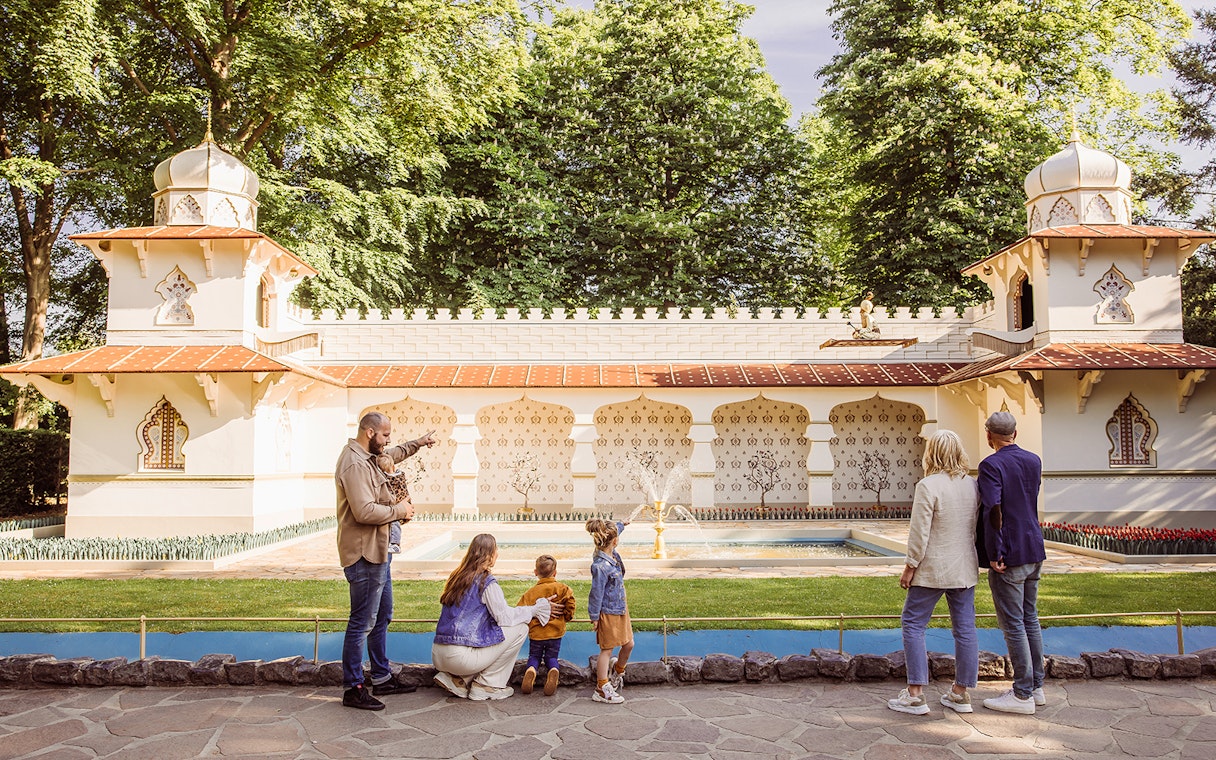 Visitors admire the Indian Water Lilies attraction at Efteling theme park.