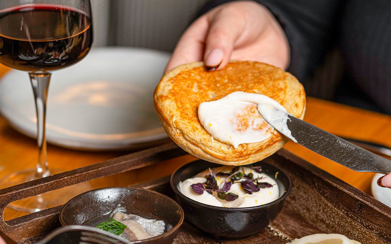 Pastry with cream spread at Flora Danica, Champs Elysées, Paris.